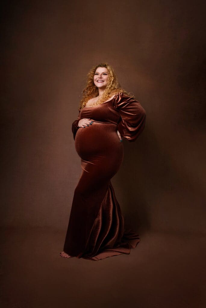 An Elegant image of a pregnant in a photography studio during a maternity photoshoot in Columbus Ohio