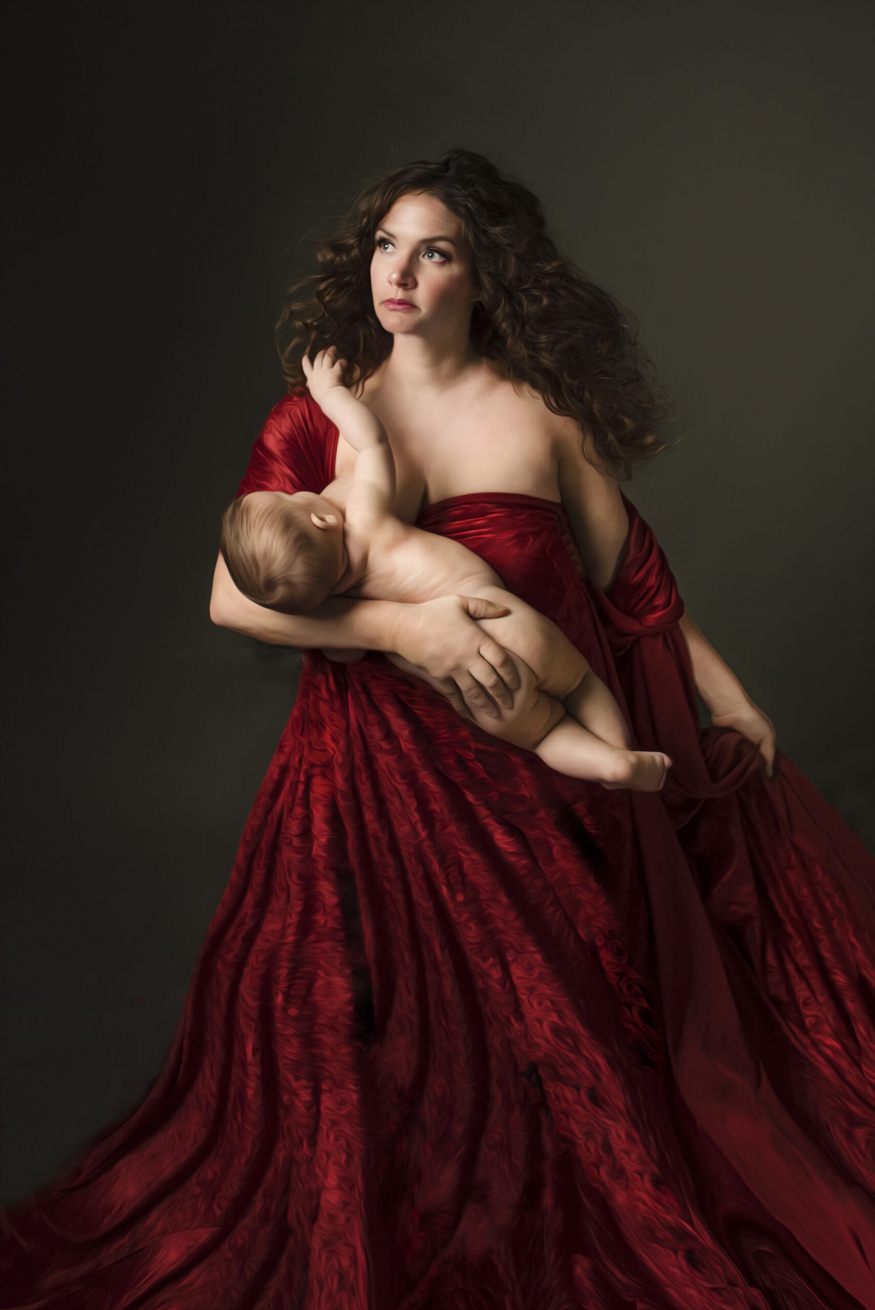 renaissance style nursing baby with red fabric