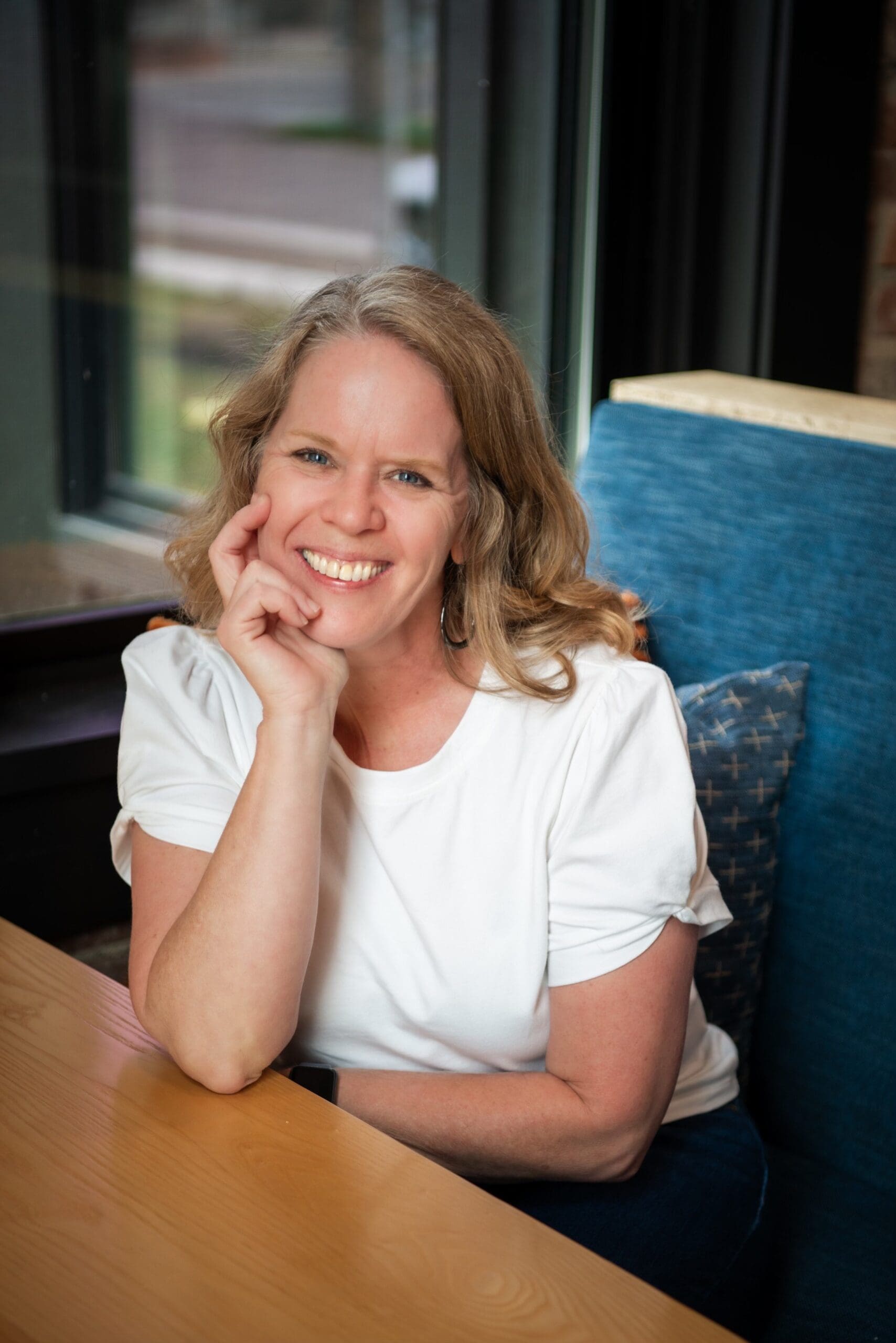 doula columbus posing with hand on chin smiling